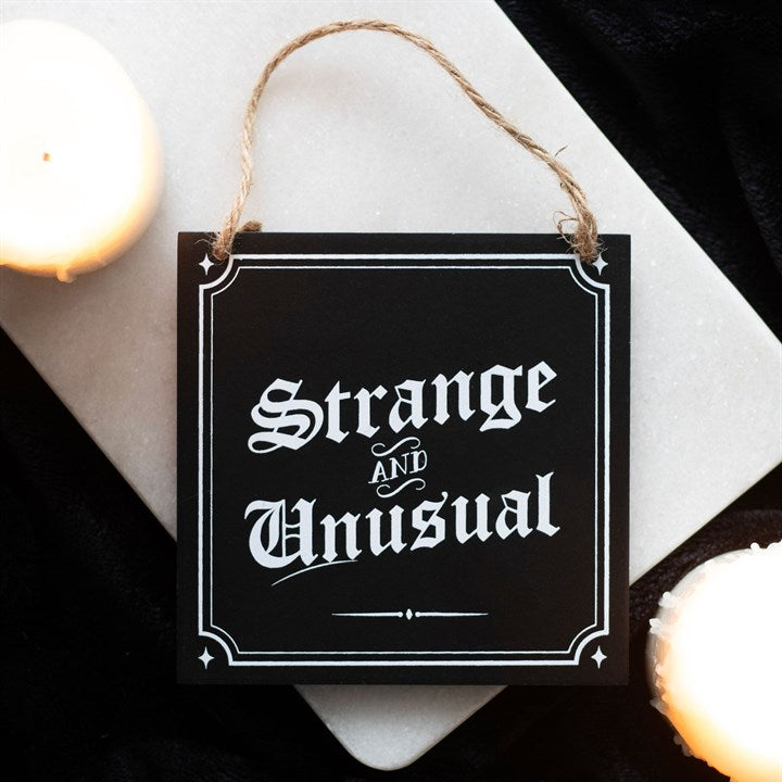 "Strange and Unusual" Hanging Sign